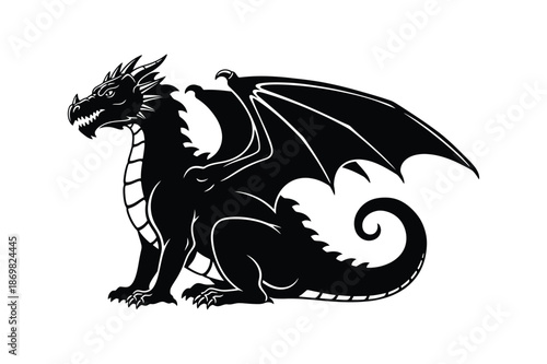 Silhouette of a mythical dragon with wings and tail in a sitting position
