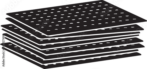 Stack of black perforated sheets