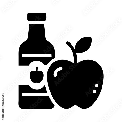 Black glyph icon of an apple and a bottle, representing natural apple juice or cider