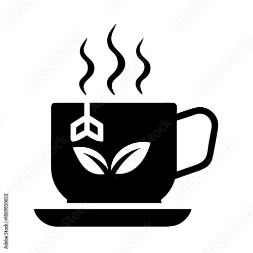 A comforting cup of hot tea with a tea bag and natural leaves, steaming gently