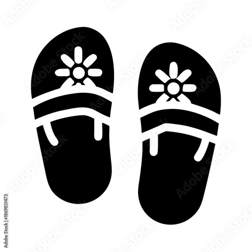 Black flip-flops with white floral design, perfect summer footwear icon
