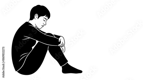 Man Sitting on Floor with Head Down.