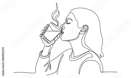 A woman is drinking a cup of coffee_26