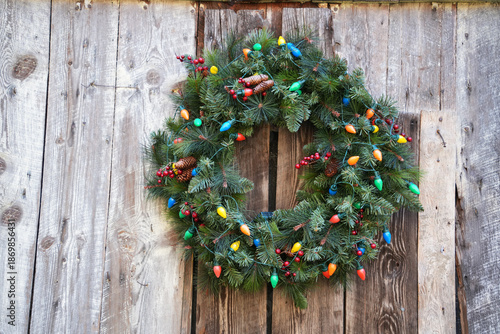 christmas wreath on wooden background
