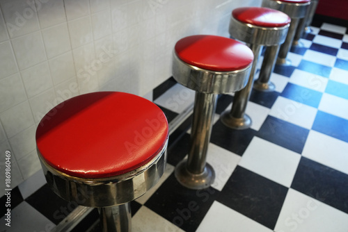 red and white chairs in old diner