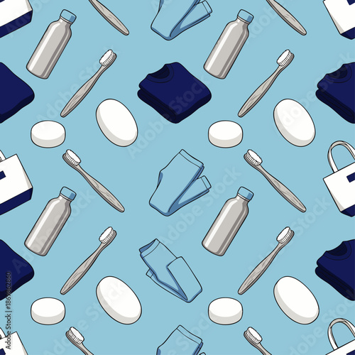 Seamless pattern of travel essentials: toiletries, hygiene products, and folded clothing on a light blue background, perfect for vacation or trip preparation.