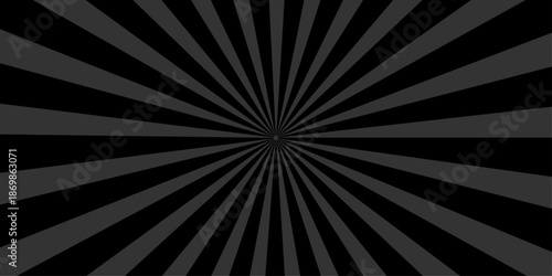 An abstract black and white sunburst background featuring retro radial rays and a grunge texture design creates a vintage starburst pattern illustration for a high contrast vector wallpaper