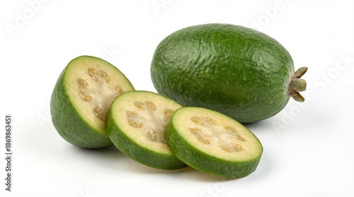 Fresh whole and sliced feijoa fruit displaying its vibrant green skin and juicy interior