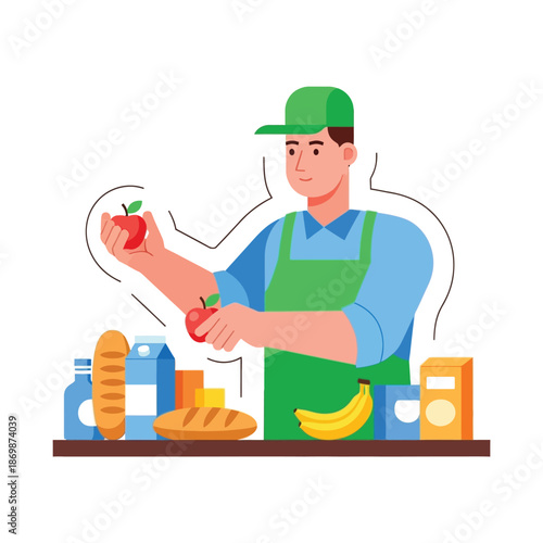 A man wearing an apron holds a tomato while standing behind a counter with various food items