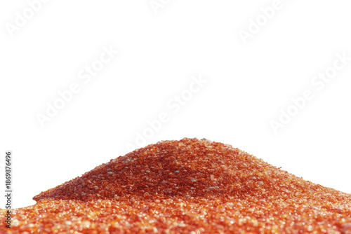 Small, textured orange mound isolated against black