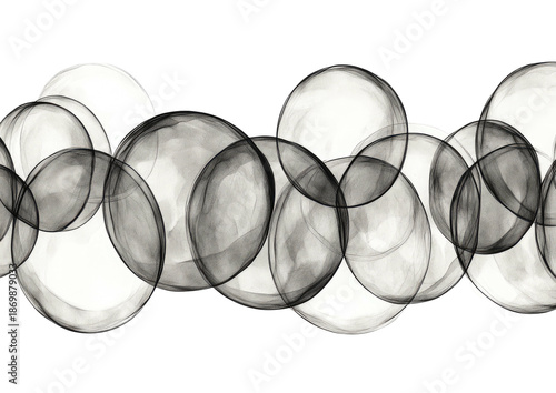 Overlapping translucent circles in grayscale on black