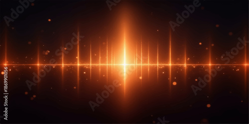 Bright orange light beam shining through dark space with lens flares and reflections