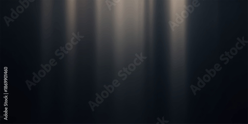 Blurry abstract background with streaks of light on dark surface
