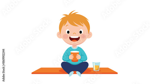 Happy little boy sitting on a mat and holding a cup of juice or beer promoting refreshments and childhood joy.
