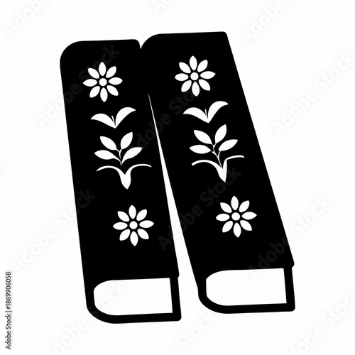 Two books with floral designs in black and white graphic style illustration