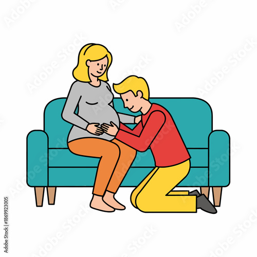 Happy expectant couple on teal sofa man kneeling with ear on pregnant woman's belly.