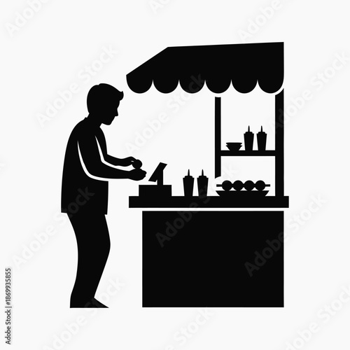 Man preparing food at stall