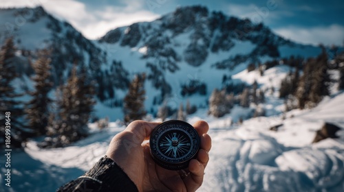 Hiker Holding Compass in Snowy Mountain Landscape with Pine Trees and Blue Sky