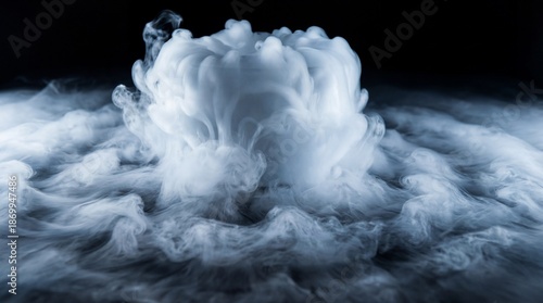 Smoke, fog or steam on black background flowing or rolling from center to edges