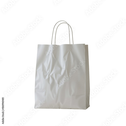 White Paper Bag Resting on a Flat Surface With Visible Wrinkles and Texture