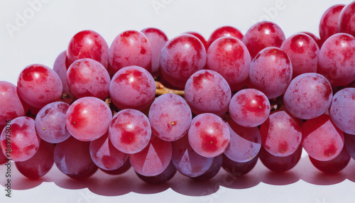 Wallpaper Mural "Close-Up of Fresh Red Grapes with Glossy Surface on White Background – Natural Produce Photography for Food, Nutrition, and Agricultural Design Concepts" Torontodigital.ca