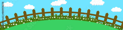 Cartoon illustration of a vibrant green field with a wooden fence under a blue sky with white clouds.