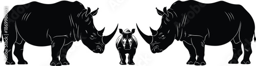 Black and white of two large rhinos and a baby rhino rhinoceros animal wildlife
