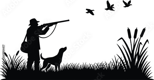 Hunter with dog aiming shotgun at flying ducks in wetland