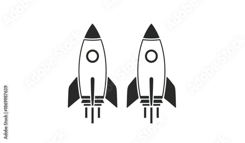 Two black and white rocket ships blasting off into space