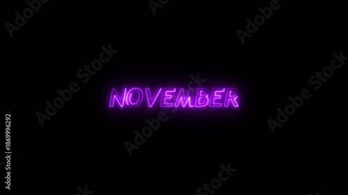 Radiant purple neon sign spelling the word NOVEMBER with a strong glow and a soft light aura against a deep black background for visual impact Keywords: November, neon, sign, word