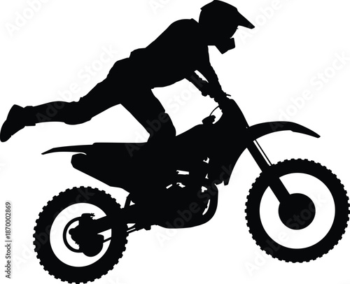 Dynamic silhouette of motocross rider performing trick jump extreme sports athlete in mid-air action stunt on dirt bike for adrenaline adventure thrill seeking recreation sports advertising and extrem