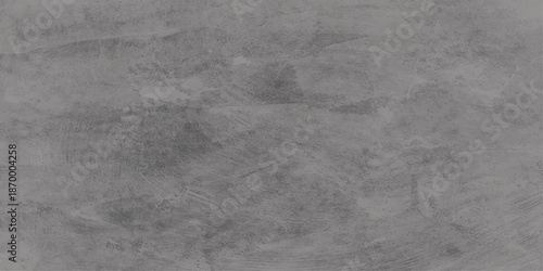 A dark and dirty vintage grunge paper texture featuring a rough grey stone pattern on a blank black and white wall surface backdrop