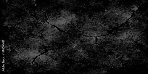 Aged dark grunge background featuring a dirty black and white textured surface with a rough vintage wall pattern for an old antique paper or stone backdrop design