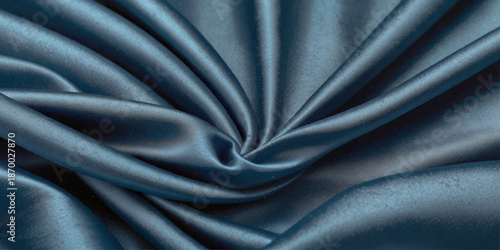 Luxurious Dark Blue Silk Satin Fabric with Smooth Flowing Folds and Silky Texture, An Abstract Elegant Background Symbolizing Fashion, Refinement, and Premium Style