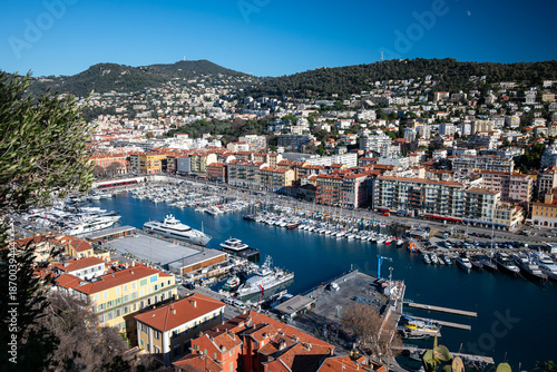 Aerial panoramic view of harbour in Nice, France as seen from hilltop  park Colline du Château (Castle of Nice)