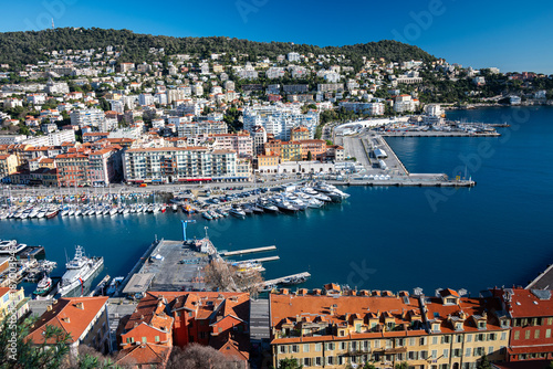 Aerial panoramic view of harbour in Nice, France as seen from hilltop  park Colline du Château (Castle of Nice)