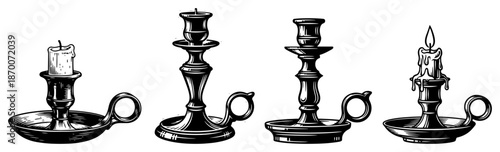 Set of vintage candlestick holders with burning candles in engraving style