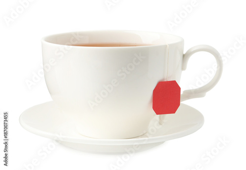 Принти на полотні Tea brewing. Cup with tea bag isolated on white