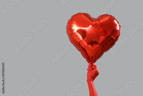 Female hand with heart-shap...