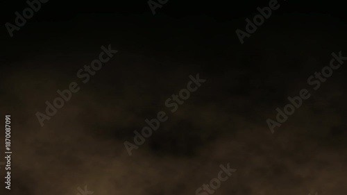 Moving soil sand dust floating on black background. Brown sandstorm dust powder particles explosion special effect or smoke in slow motion. 4k seamless looping video