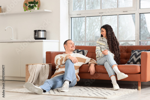 Young couple in warm sweate...