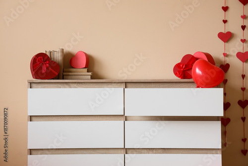Chest of drawers with books...