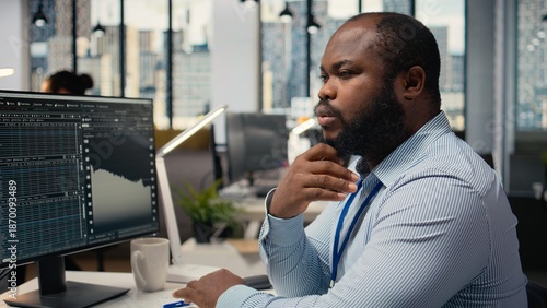 Canvas-taulu Close up of trader analyzing stock exchange analytics, doing thinking, evaluating trading strategy in prop firm office