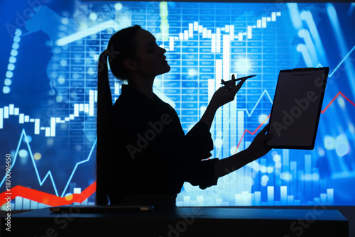 Silhouette of businesswoman...