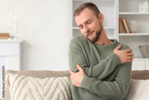Young man in green sweater ...