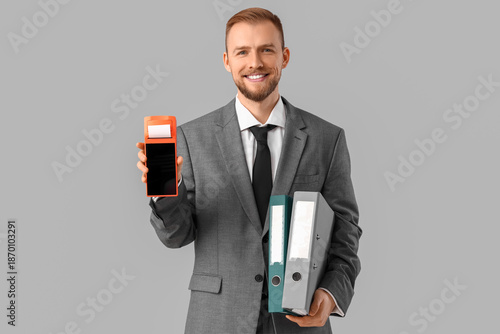Young businessman with paym...