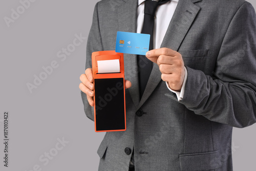Young businessman with paym...
