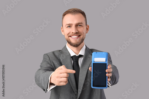 Young businessman pointing ...