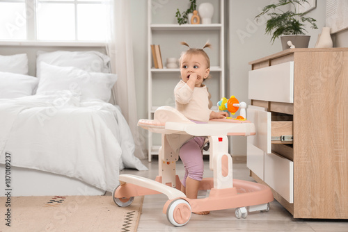 Cute little baby girl using...