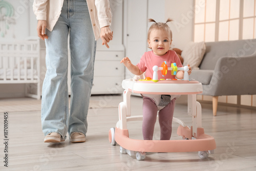 Cute little baby girl using...